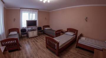Фото номера Четырехместный номер Гостиница Guest house Postoyalyi Dvor г. Ханты-Мансийск 3
