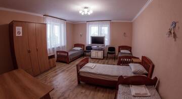 Фото номера Четырехместный номер Гостиница Guest house Postoyalyi Dvor г. Ханты-Мансийск 2