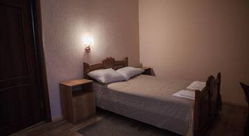 Фото номера Стандартный люкс Гостиница Guest house Postoyalyi Dvor г. Ханты-Мансийск 3