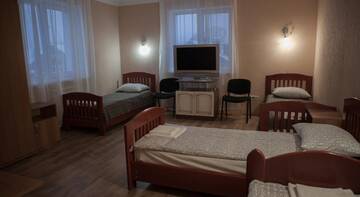 Фото номера Четырехместный номер Гостиница Guest house Postoyalyi Dvor г. Ханты-Мансийск 5