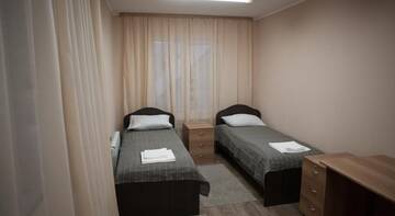 Фото номера Двухместный номер с 2 отдельными кроватями Гостиница Guest house Postoyalyi Dvor г. Ханты-Мансийск 2
